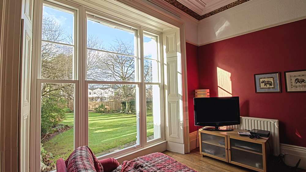 Internal images of triple sash window installation almost impossible to tell that these are not original timber sash windows, however having the benefits of modern double glazing and low maintenance UPVC.