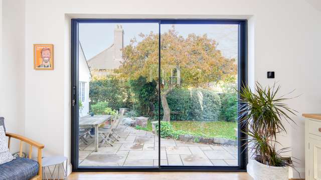 Striaght on view of our Knight Line aluminium sliding door Manchester.