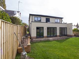 External view of full house installation of Grey aluminium windows and doors.