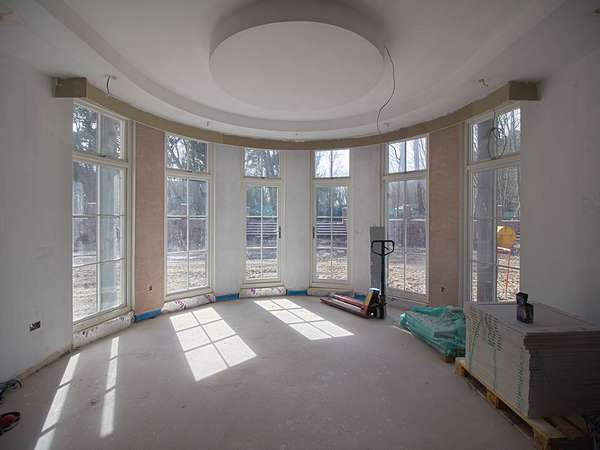 Rounded bay window progress, windows looking much better with some plaster and paint.
