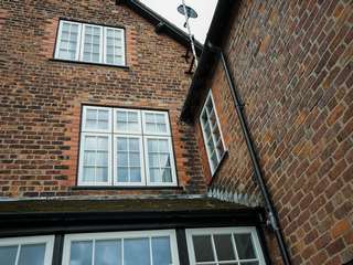 Various windows throughout the rear of the property updated to Evolution timber alternative windows.