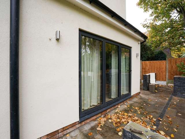 Tripple bifold doors allowing access to the rear entertaining area.