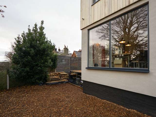 External view of large alu-clad timber window from Rationel.