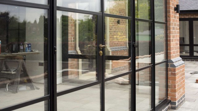 Close up showing the glazing bar details on the large Crittall screen.
