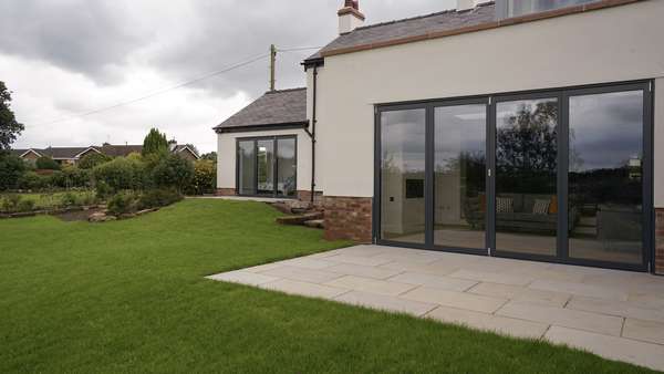 Close up of the Centor bifold doors in RAL 7016.