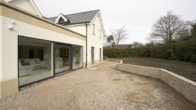 External view of the large Internorm sliding door at this new build bespoke property.
