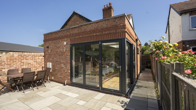 External image of this brick extension with the doors closed.