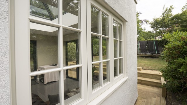 Traditional UPVC timber style window from Evolution giving a period appropriate look to the home.