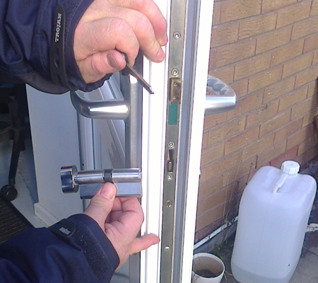 Door lock replacement on UPVC door.