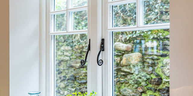 Kitchen window with supporting wall view to garden