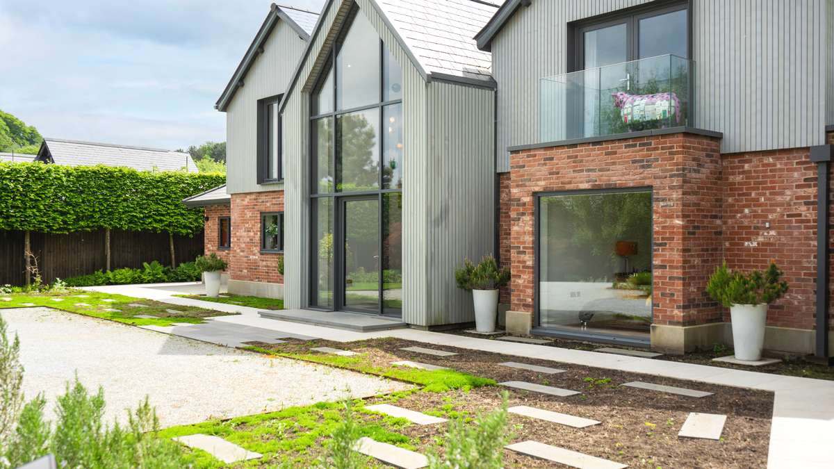 Agate Grey Composite Door Installation with black doctors knocker.