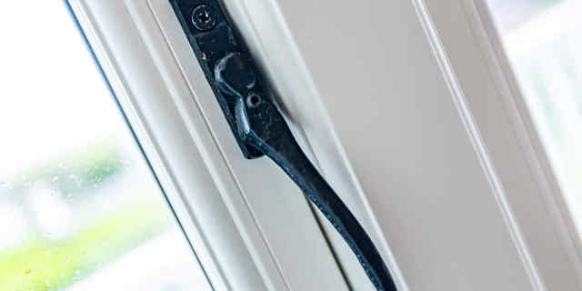 Black window handle close up 