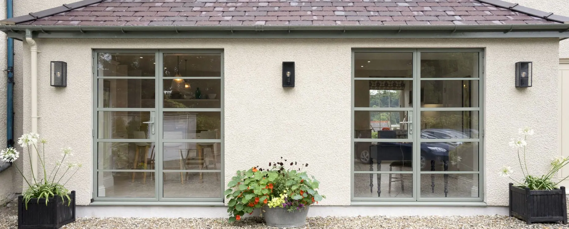 Custom Ral steel alternative doors with horizontal glazing bars.