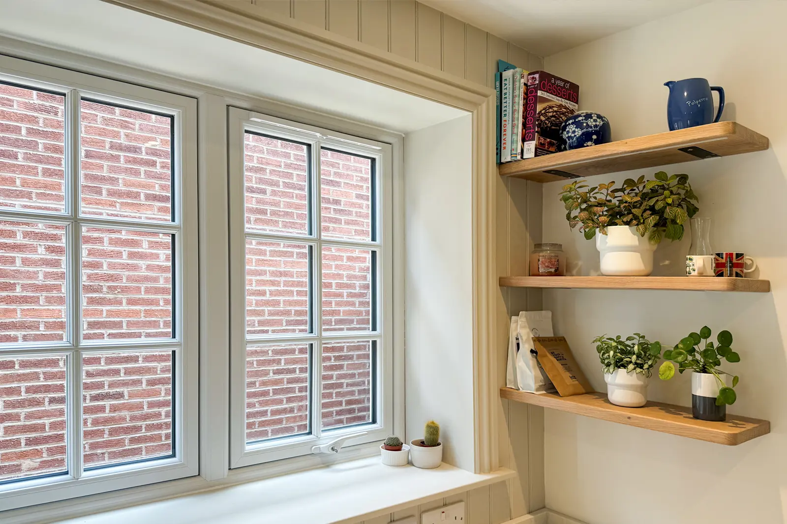 Kitchen window with oak shelves