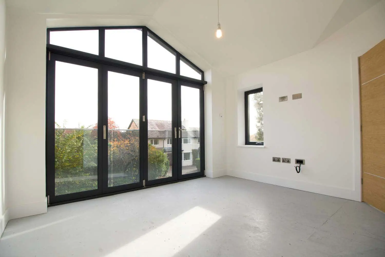 Bi-fold doors installed in master bedroom.