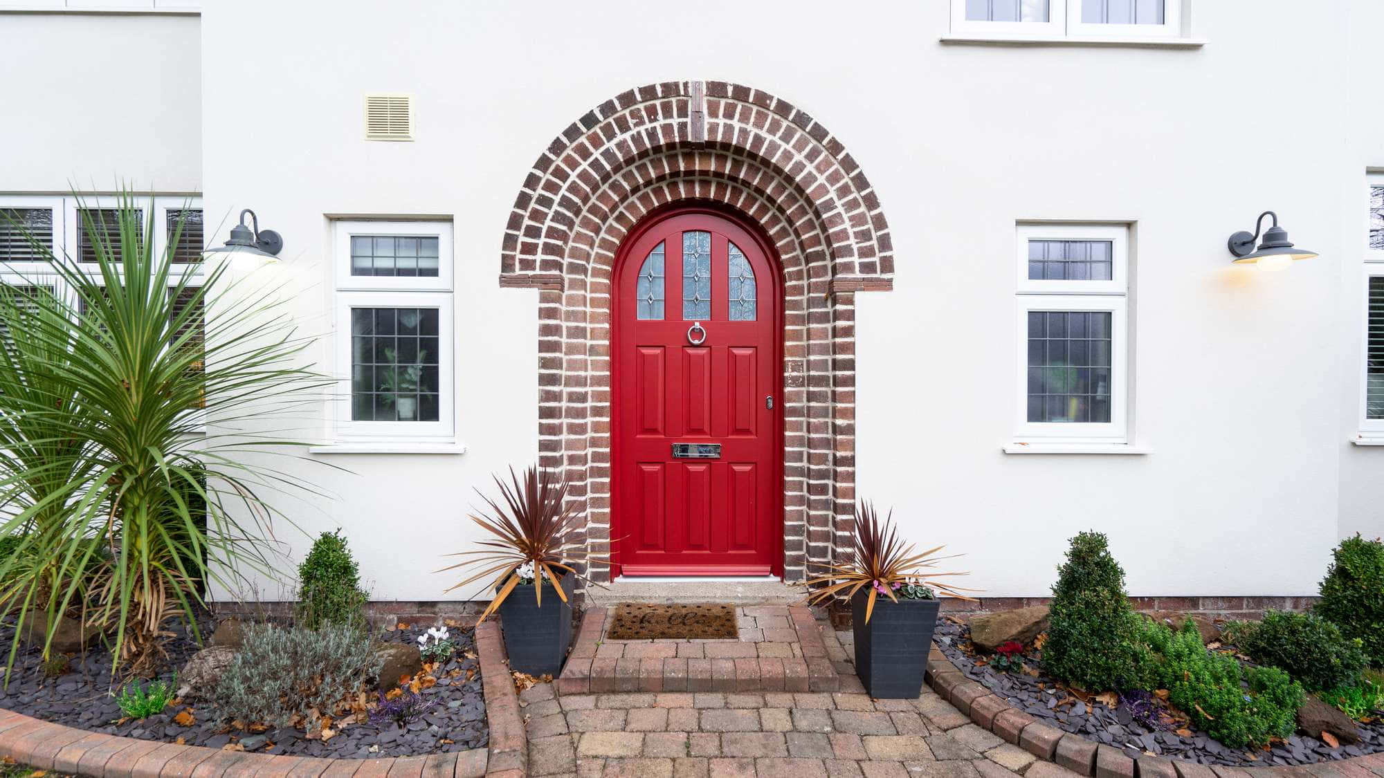 Edwardian Timber door in red with stained glass.
