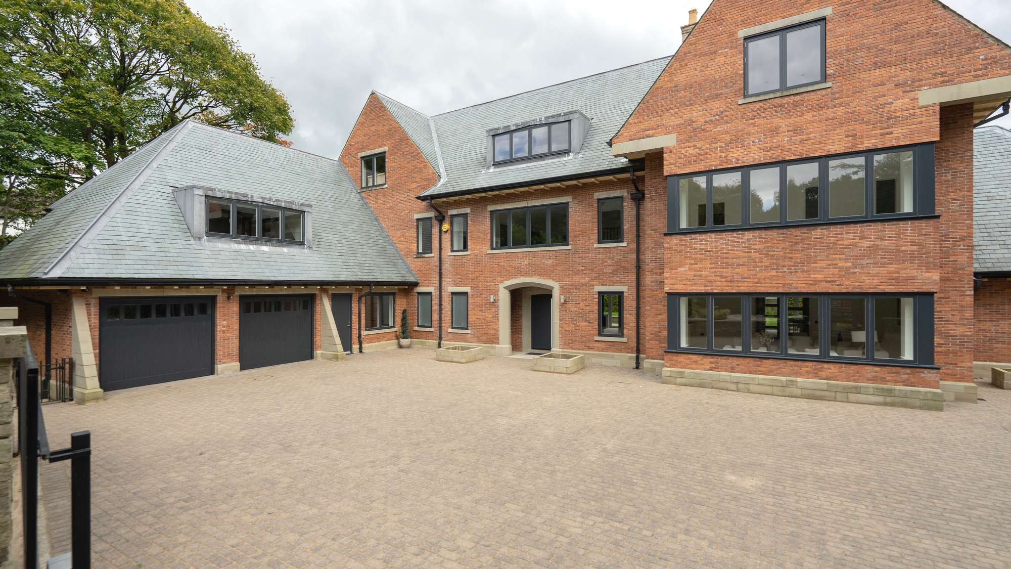 Agate Grey Composite Door Installation with black doctors knocker.