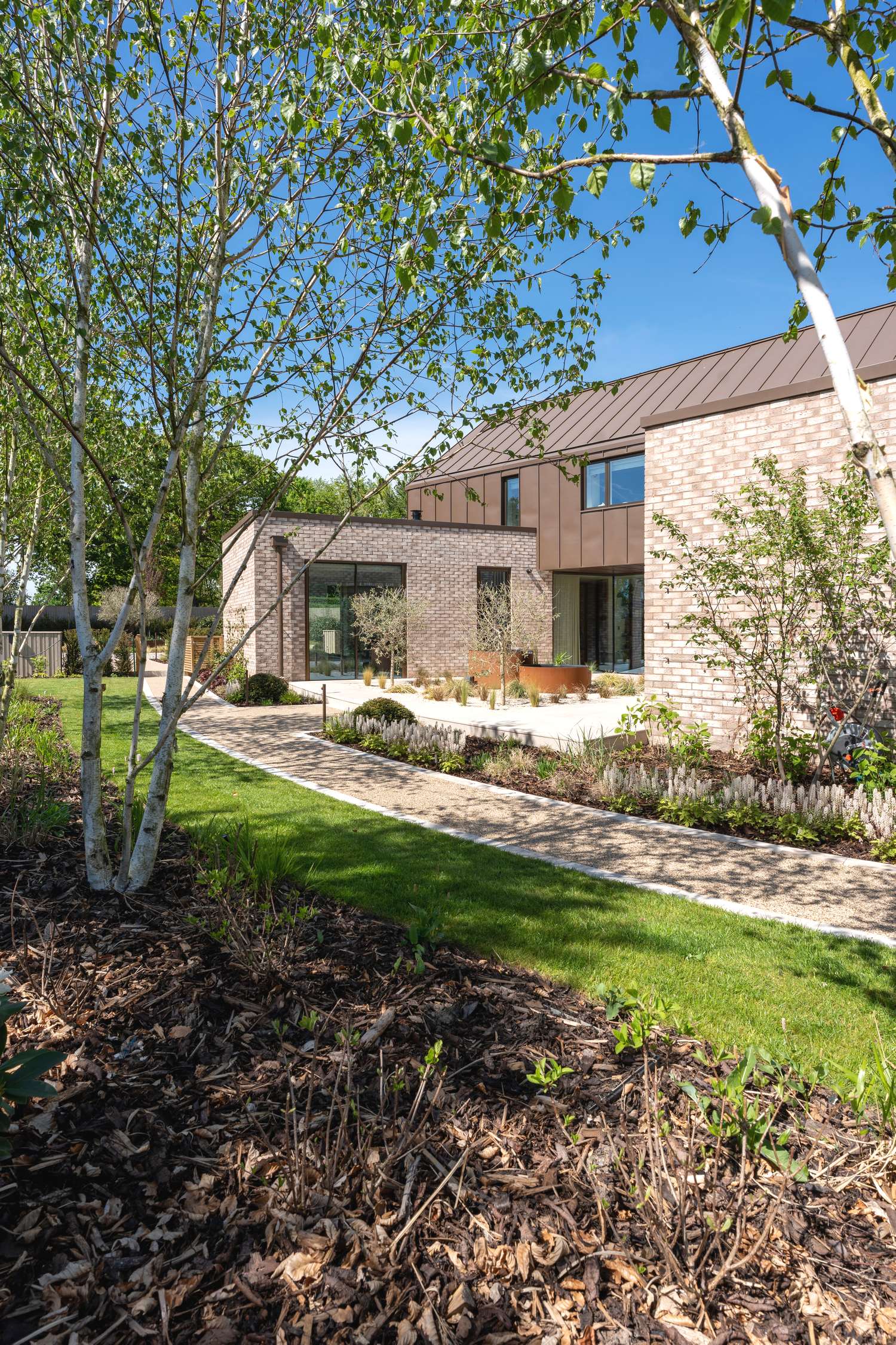 Agate grey composite door against red brickwork