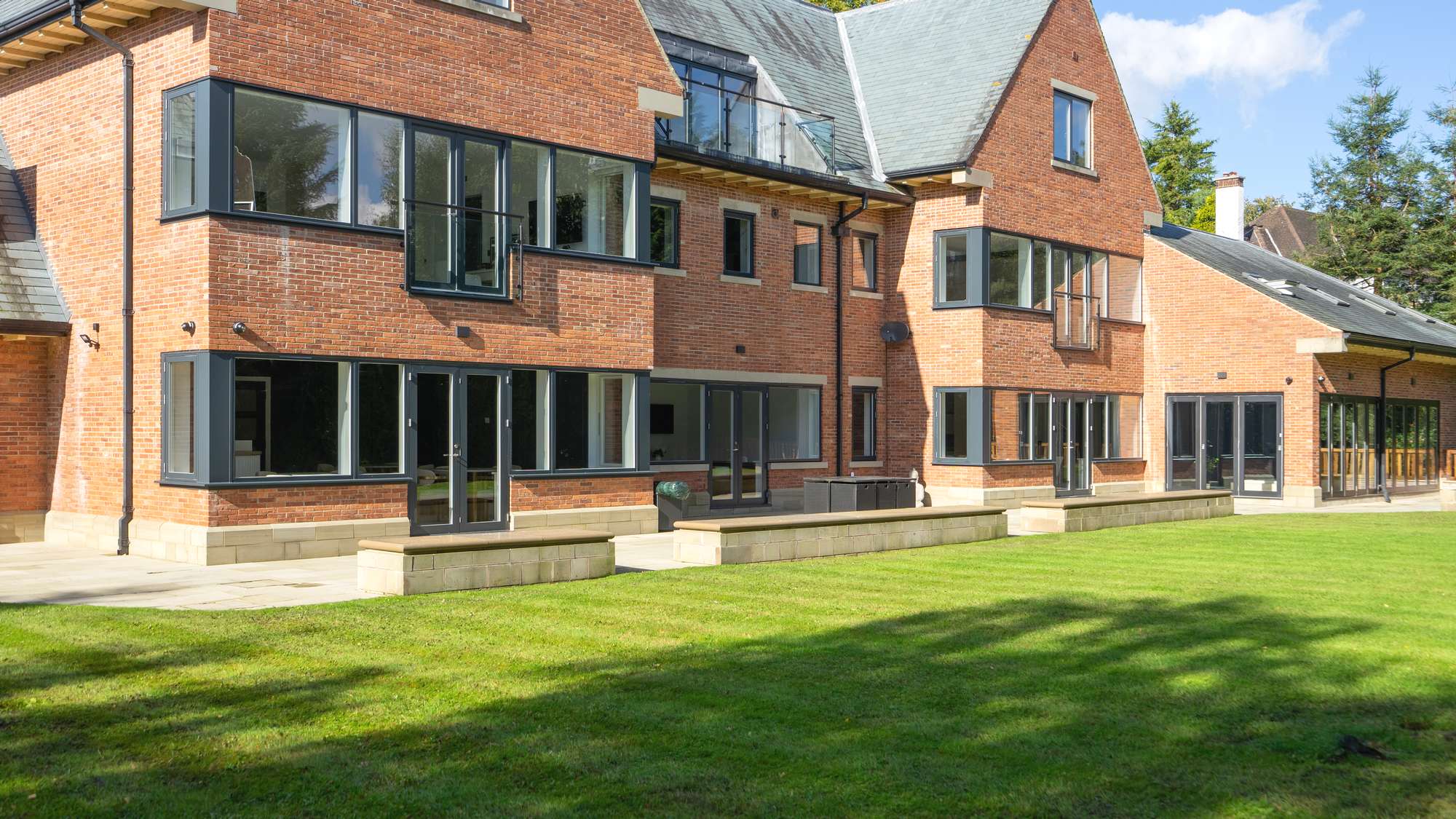 Agate grey composite door against red brickwork
