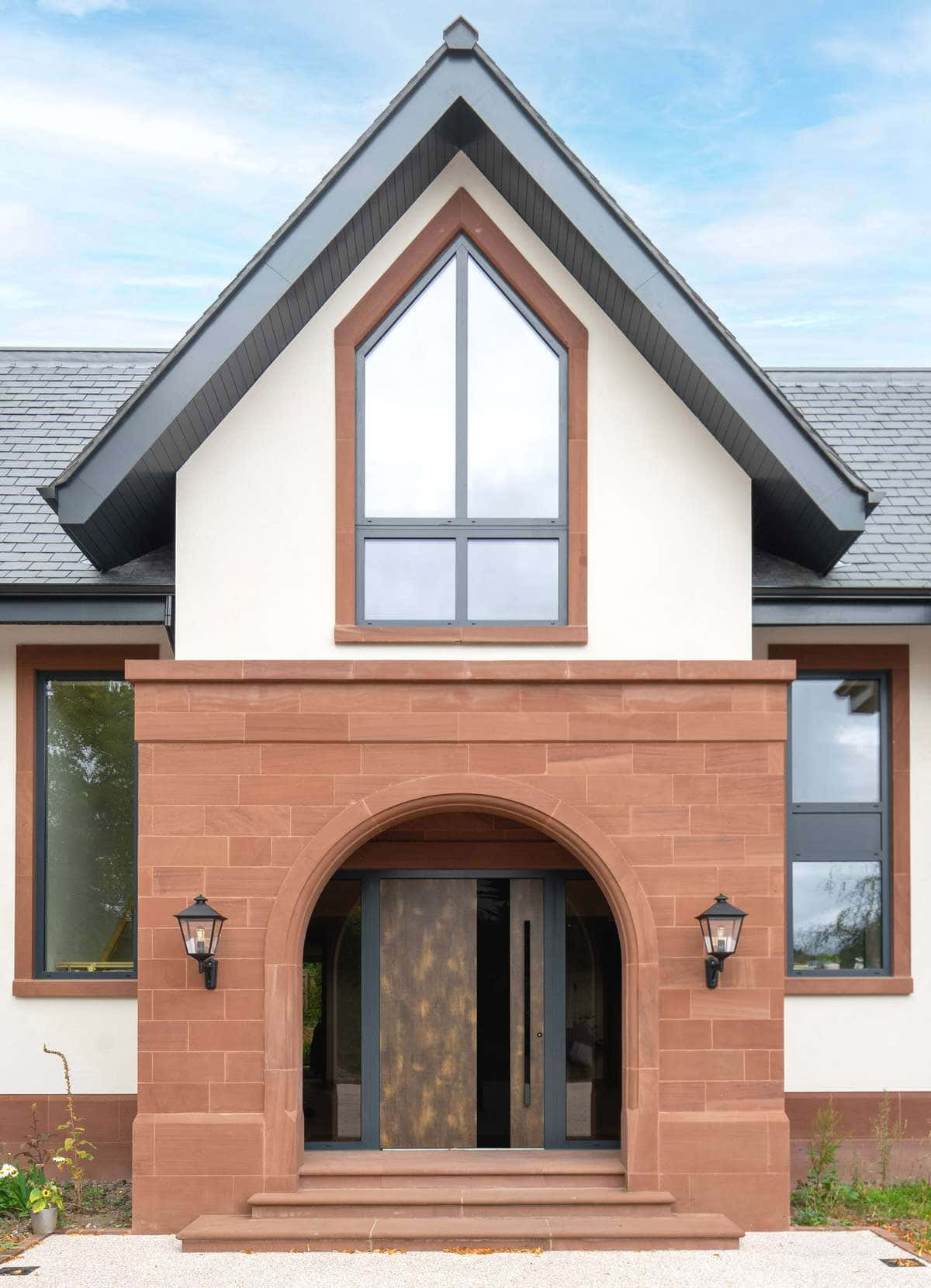 Agate grey composite door against red brickwork