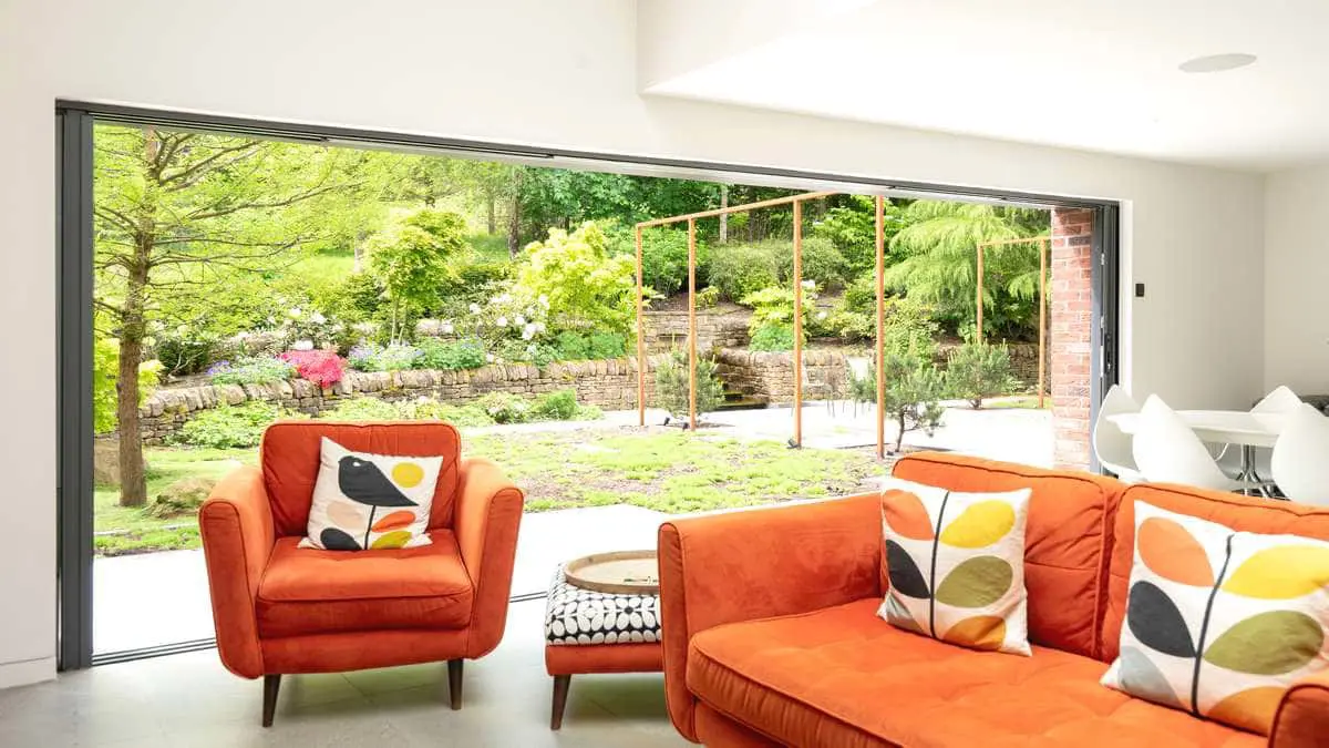 Internal view of the sliding pocket door showing it fully open with all panels hidden within the walls of the home.