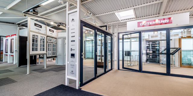 Wide showroom photo showing Dutemann bi-fold doors