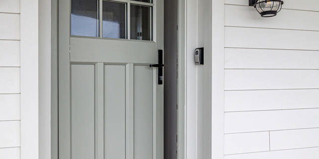 Slightly open door to holiday home
