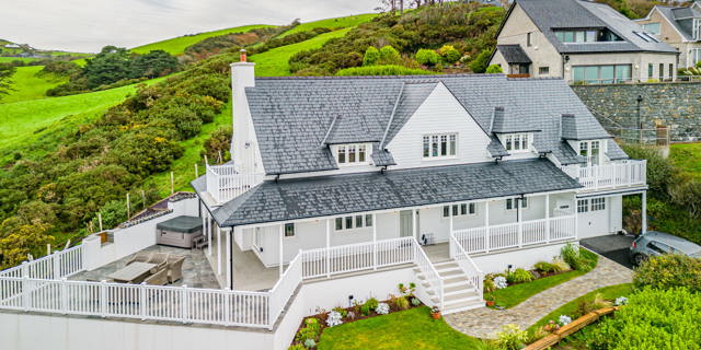 Drone shot of holiday home left side with garden
