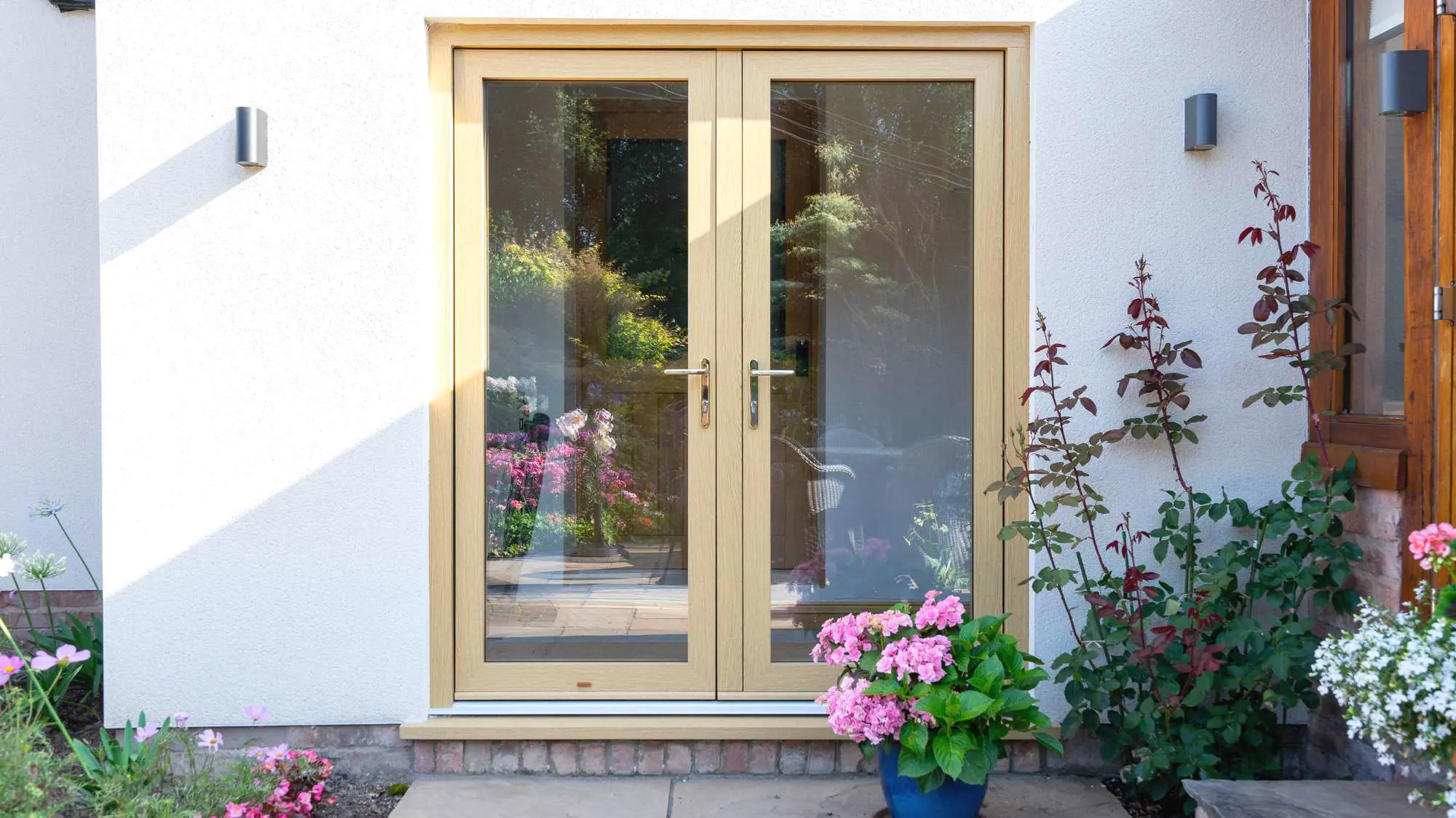 Oak effect UPVC timber alternative French doors.