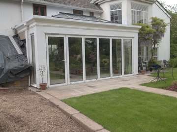 White bifold doors from Centor installed in Wavertree Liverpool. Triple glazed to provide a low u-value and excellent thermal efficiency.