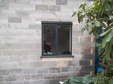 Woolton Liverpool .simple picture of our Allstyle Alumnium Window, Double glazed . slimline profile. 7016 grey. 