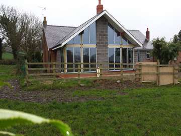 Ormskirk in Lancashire. The phot shows an installtion of our AMS 44mm Triple glazed Aluminium windows. The frames have achieved a Overall u value of 1. self cleaning glass