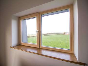 Internal shot of alu clad internorm windows perfectly framing the beautiful view.