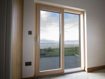 Internal shot of Internorm lift and slide alu clad sliding doors.