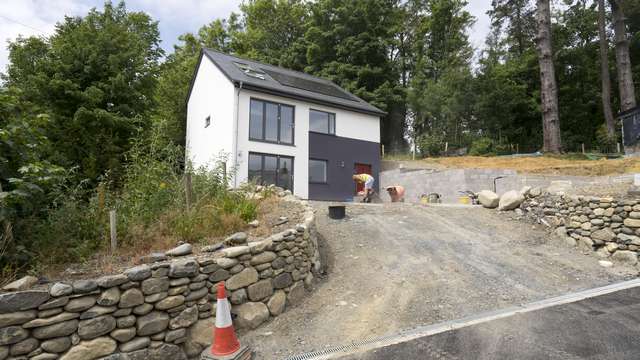 Alternative angle of this full house installation with Grey RAL 7016 windows and doors.