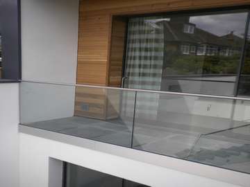 slimline HUKE door system with Q Rail Balastrading