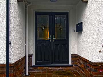 External shot of double composite door installed in Heswall.