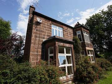 Evolution timber alternative UPVC windows installed throughout this sandstone property. 