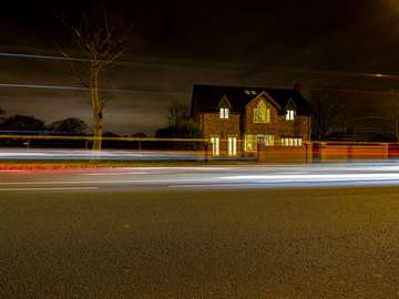 Beautiful install of bespoke George barnsdale arched window, taken at night.