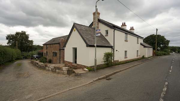 Main view of this Cheshire cottage featuring a full Rationel window installation.