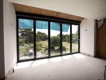 5 panel Centor bifold doors in aluminium fitted on the Wirral as part of a large property renovation. The doors where supplied in anthracite grey to give a modern contrast to this traditional property.