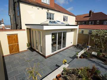 Installation of Atlus aluminium roof lantern and Centor bifold doors in Hoylake, Wirral. Project was completed with 44mm triple glazing to ensure low U values for enhanced energy efficiency.