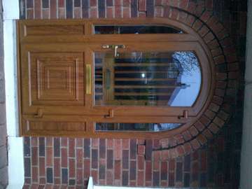 Installation of a golden oak Pvcu Arched door combination in West Kirby Wirral. The client was looking to reproduce an arched pvcu door combination to match the original timber door including arching the main door leaf. Fabricated in decurninick Pvc Profile, the door was fitted with a 4 point hook bolt lowing system. Anti bump locks as standard .the installation was carried out in one day by our own Wirral Pvcu installation tem in one day.