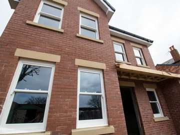 New build installation featuring UPVC sash windows.