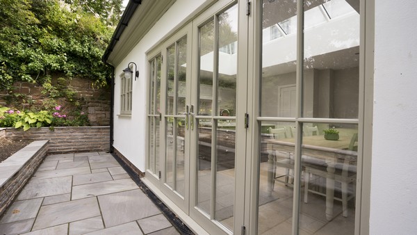 Close up of the french doors highlighting the beautiful constrcution of these doors, notice the glazing bar details and stunning timber sashes.