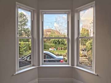 Bay window sliding sash installation.