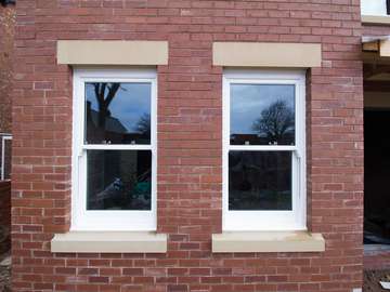 Perfectly aligned UPVC sash window installation in Formby, Liverpool.