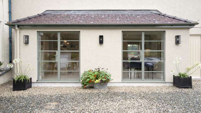 Straight on images showing installation of period correct UPVC sash windows improveing the look and energy efficiency of the original timber sash windows.