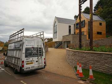 Modern new build property featuring a range of aluminium products including windows, bifolds and entrance door.