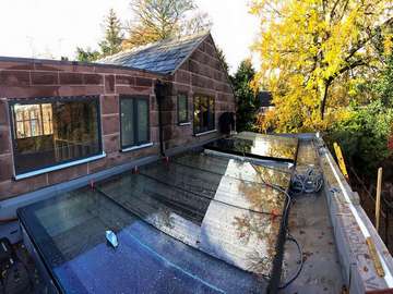 Installation complete on two all glass large flat roof lights.